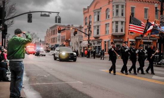 Ohio Photographer Captures Old Man Saluting US Flag at Christmas Parade—Tracks Him Down for a Talk