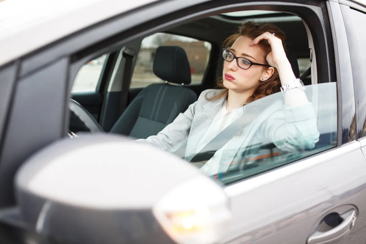 When a traffic jam gets the best of you, try giving a good laugh about the situation. (BalanceFormCreative/Shutterstock)