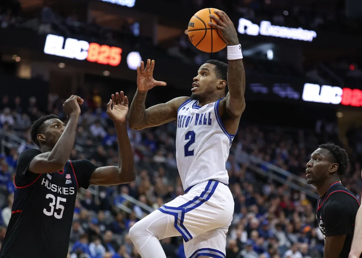 Seton Hall Pirates guard Al-Amir Dawes (2) drives to the basket as Connecticut Huskies forward Samson Johnson (35) defends during the second half at Prudential Center in Newark, N. J., on Dec. 20, 2023. (Vincent Carchietta/USA TODAY Sports via Field Level Media)