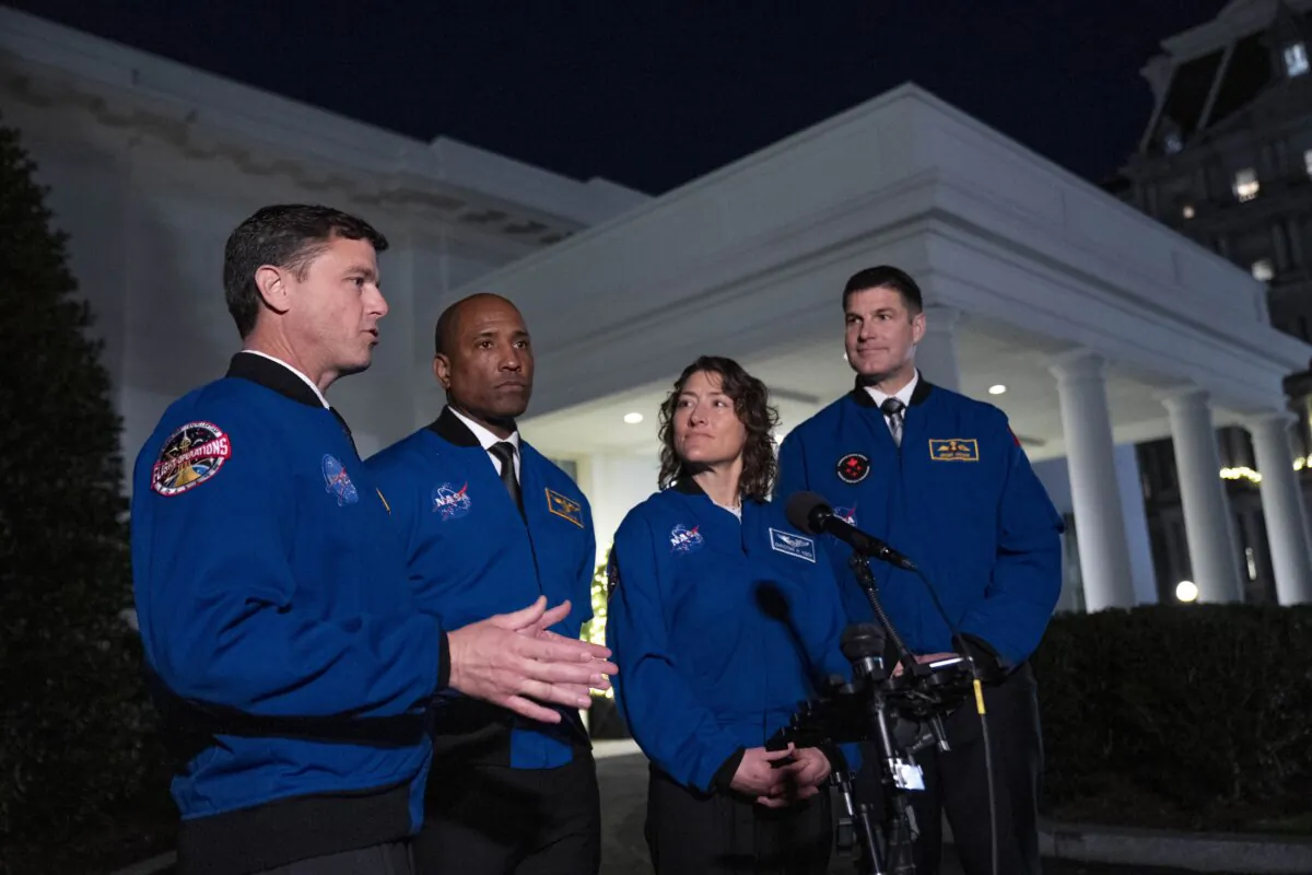 Artemis II crew members (L–R), Reid Wiseman, Victor Glover, Christina Hammock Koch, and Jeremy Hansen speak to members of the media outside the West Wing of the White House on Dec. 14, 2023, after meeting with President Joe Biden. (Andrew Harnik/AP Photo)