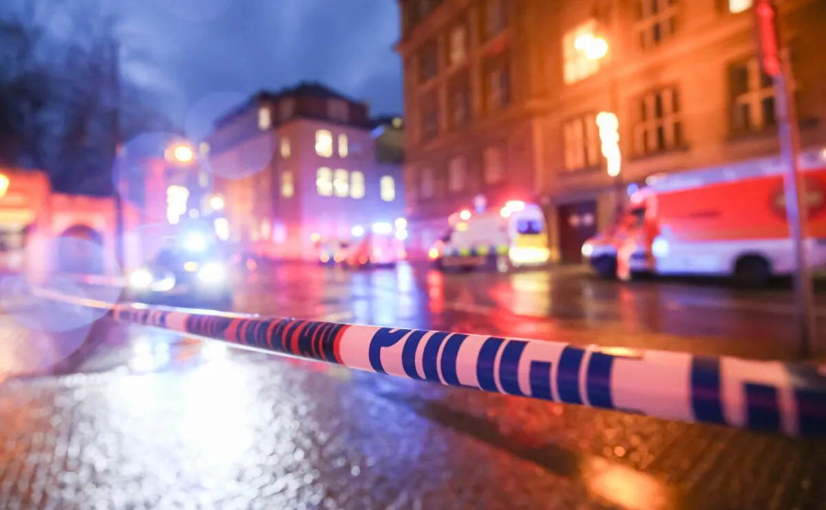 Emergency services personnel wait at a cordon around Charles University, the location of the shooting in Prague, the Czech Republic, on Dec. 21, 2023. (Gabriel Kuchta/Getty Images)
