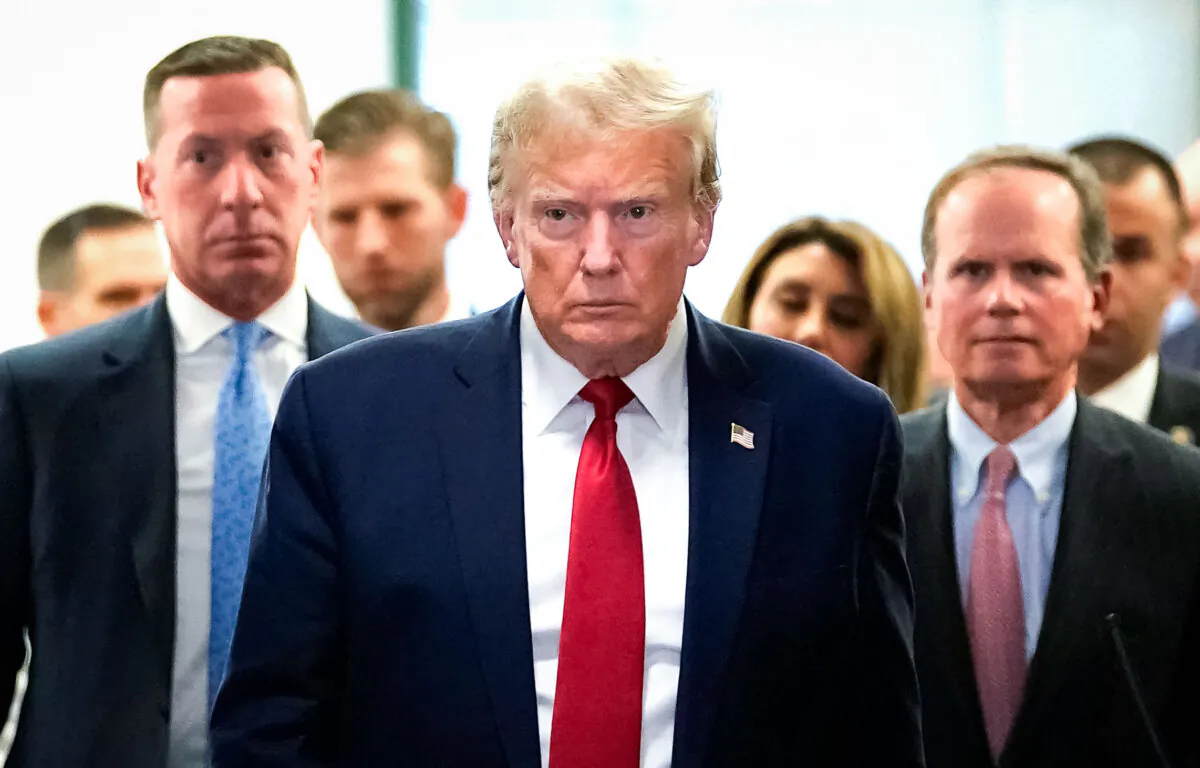 Former President Donald Trump leaves the courtroom during a break in the civil fraud trial against the Trump Organization at the New York State Supreme Court in New York City on Dec. 7, 2023. (Timothy A. Clary/AFP via Getty Images)