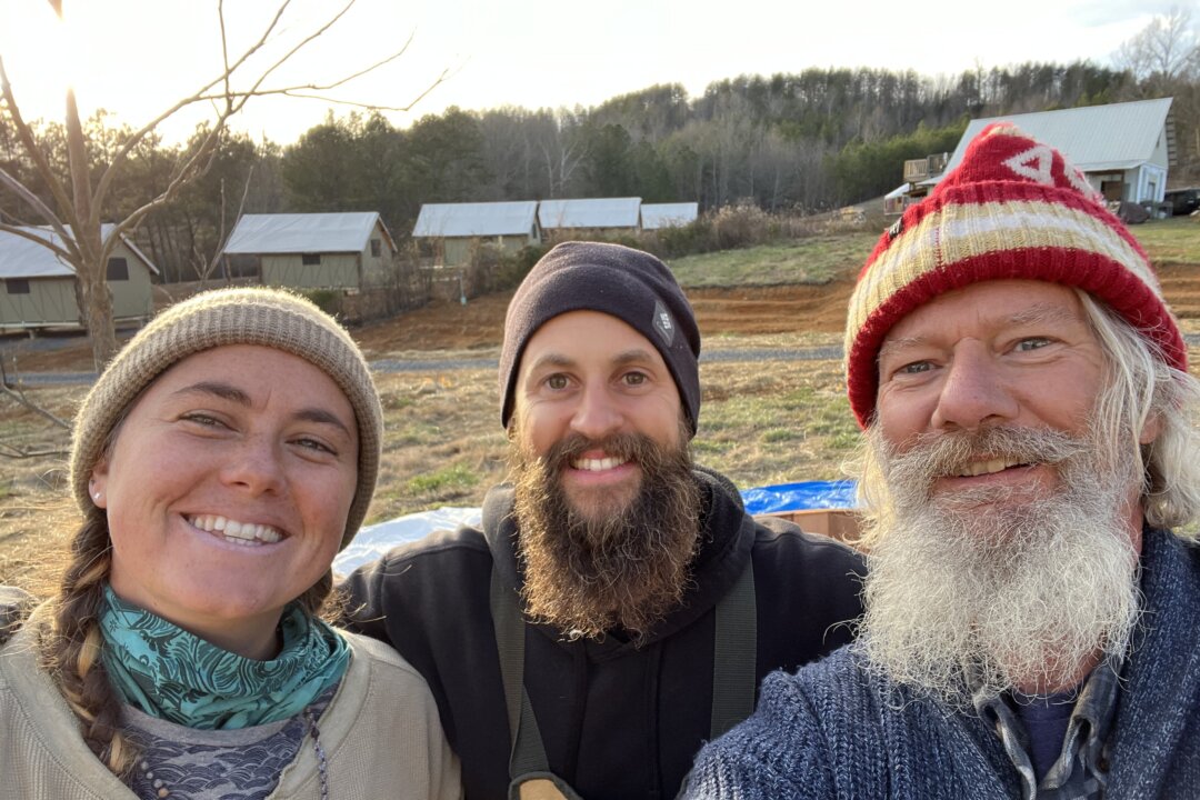 Ted Marshall (on the right) with 2 of his friends building a hot tub and sauna earlier this month.(Haven Village)