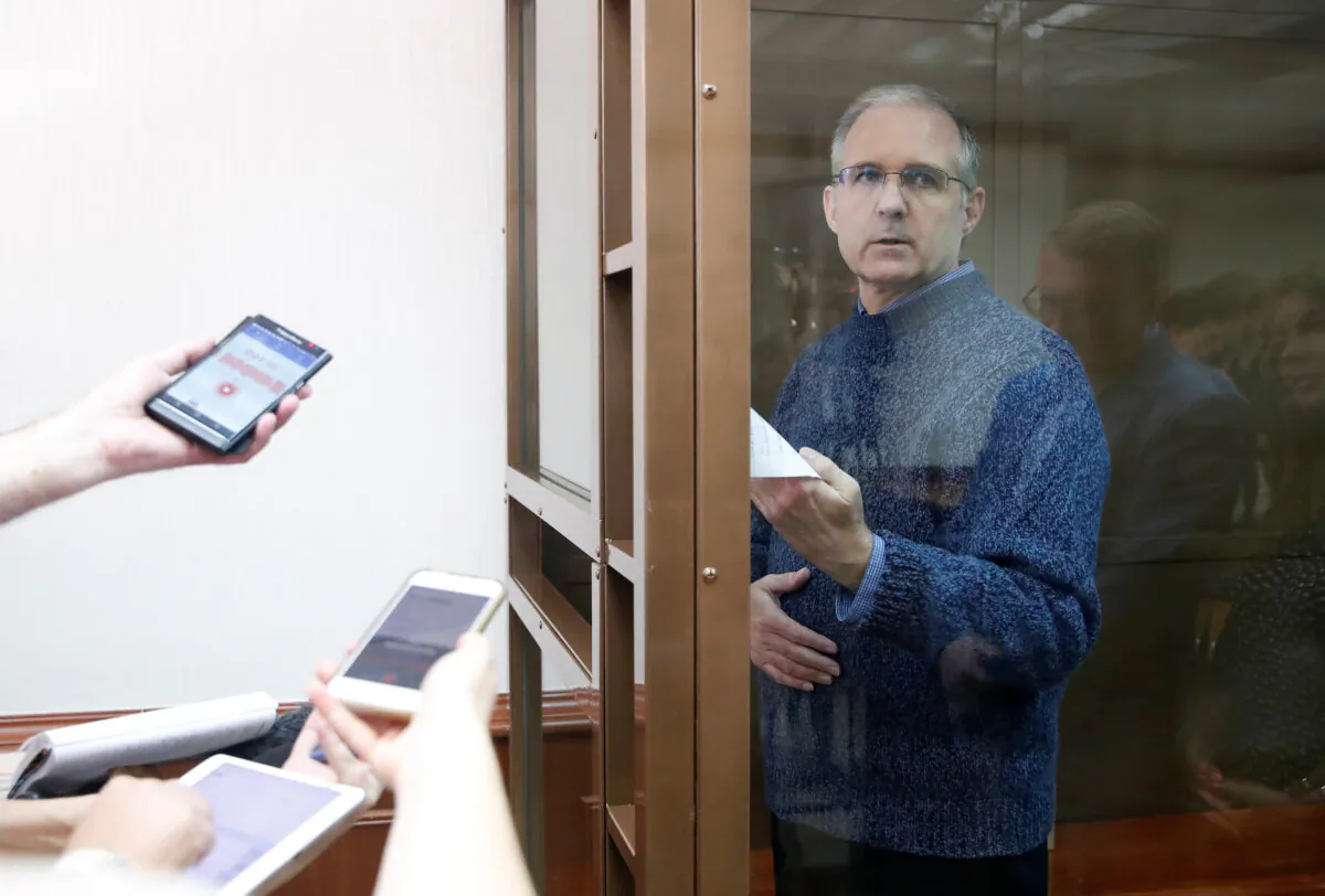 Former U.S. Marine Paul Whelan stands inside a defendants' cage during a court hearing to consider an appeal to extend his detention in Moscow, Russia, on June 20, 2019. (Maxim Shemetov/Reuters)