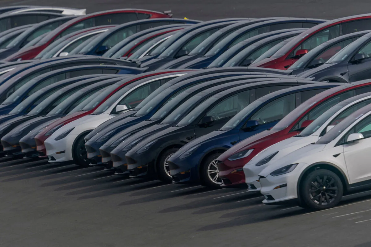 Tesla vehicles are parked at a parking lot in Richmond, Calif., on Dec. 14, 2023. (Carlos Barria/Reuters)