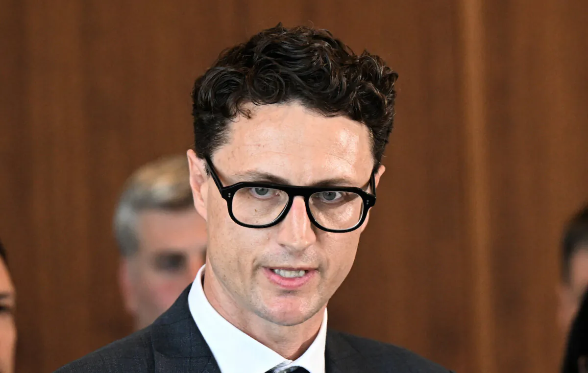 Queensland Minister for Transport and Main Roads, Bart Mellish is seen during a press conference in Brisbane, Dec. 18, 2023. (AAP Image/Darren England)