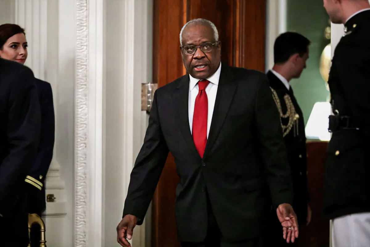 Supreme Court Justice Clarence Thomas arrives for the ceremonial swearing in of Justice Brett Kavanaugh in the White House on Oct. 8, 2018. (Chip Somodevilla/Getty Images)