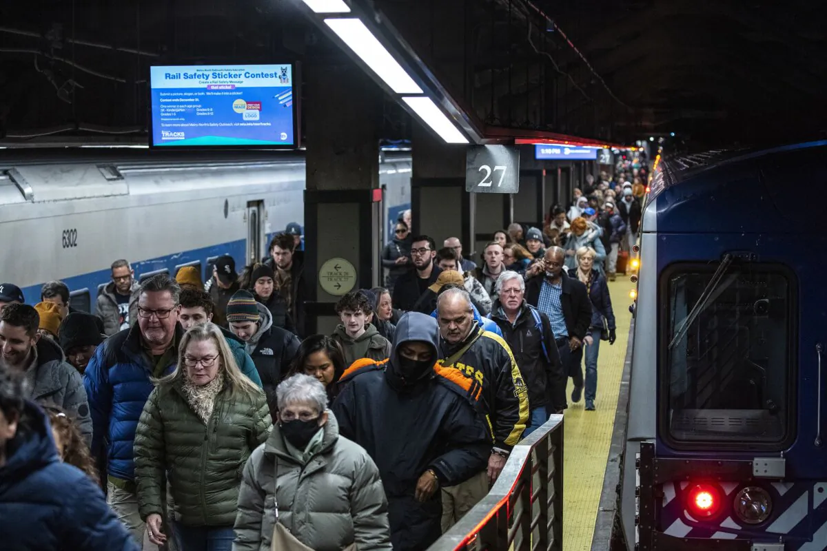 Travelers walk along the platform as they arrive at Grand Central Station in New York on Dec. 21, 2023. (Eduardo Munoz Alvarez/AP Photo)
