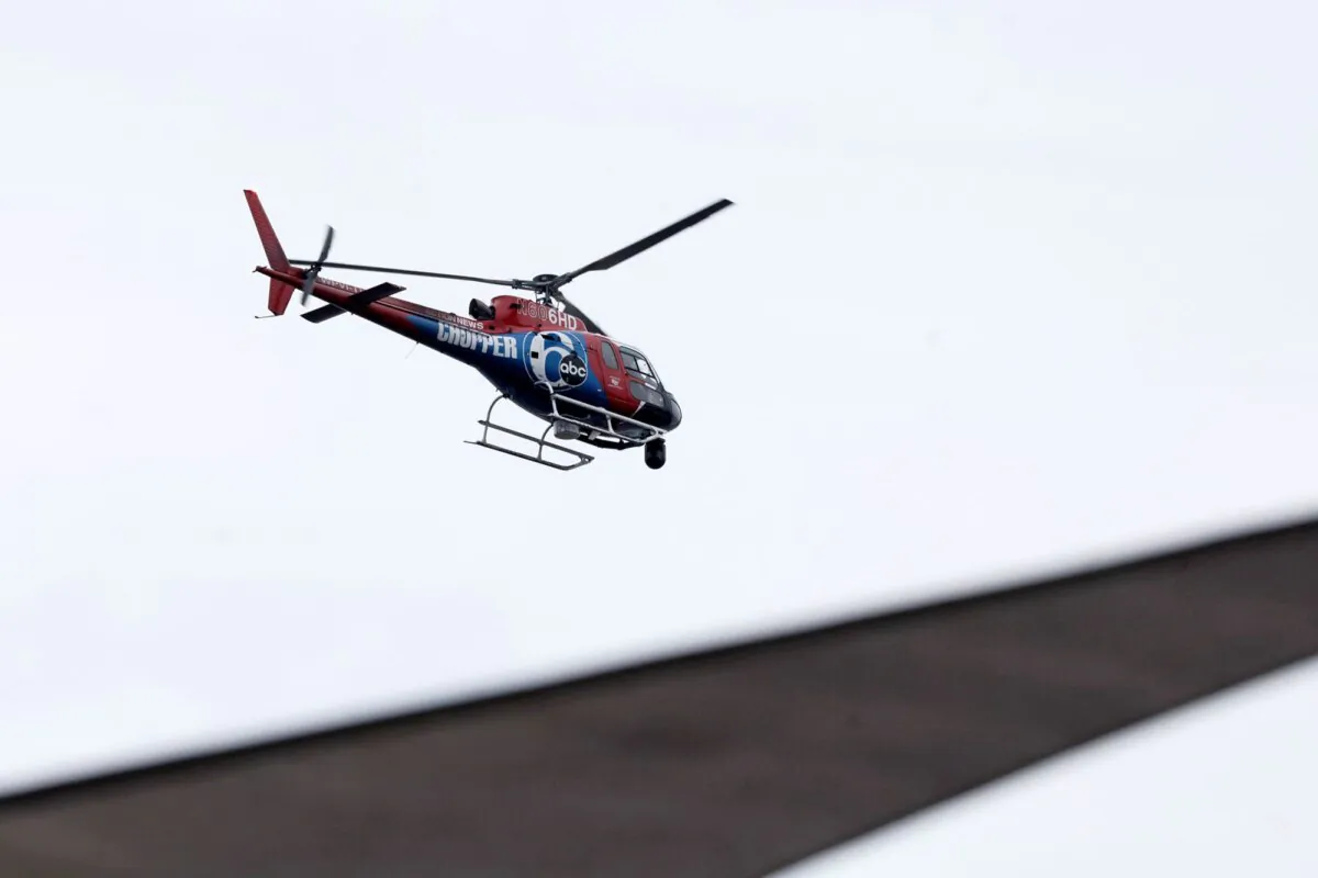 The 6ABC helicopter known as Chopper 6 flies over Philadelphia's Penn Landing on Sept. 7, 2023. (Elizabeth Robertson/The Philadelphia Inquirer via AP)