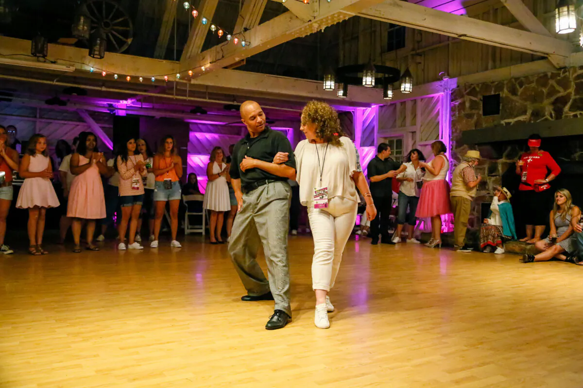 Participants in a "Dirty Dancing" weekend at Mountain Lake Lodge in Pembroke, Virginia, take advantage of dance lessons. (Photo courtesy of Mountain Lake Lodge.)