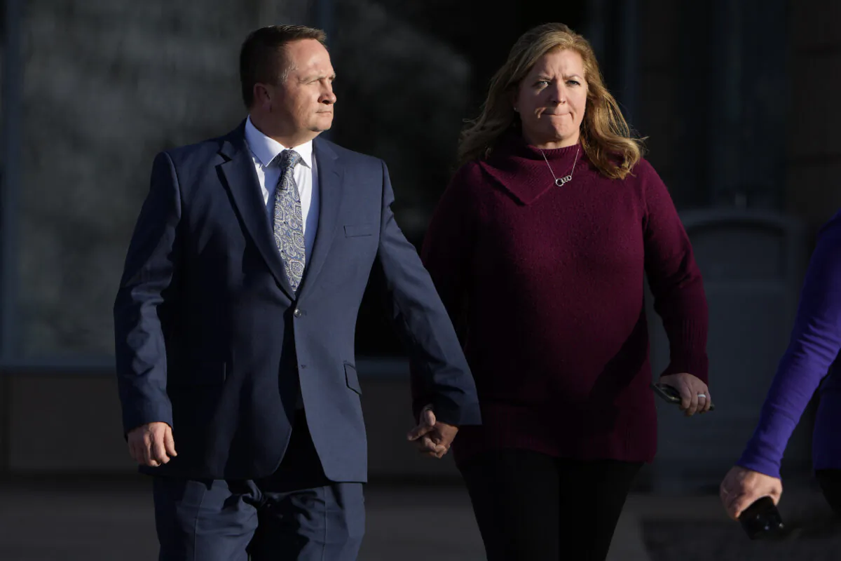 Paramedic Jeremy Cooper (L) enters the Adams County, Colo., Justice Center in Brighton, Colo., on Dec. 22, 2023. (David Zalubowski/AP Photo)