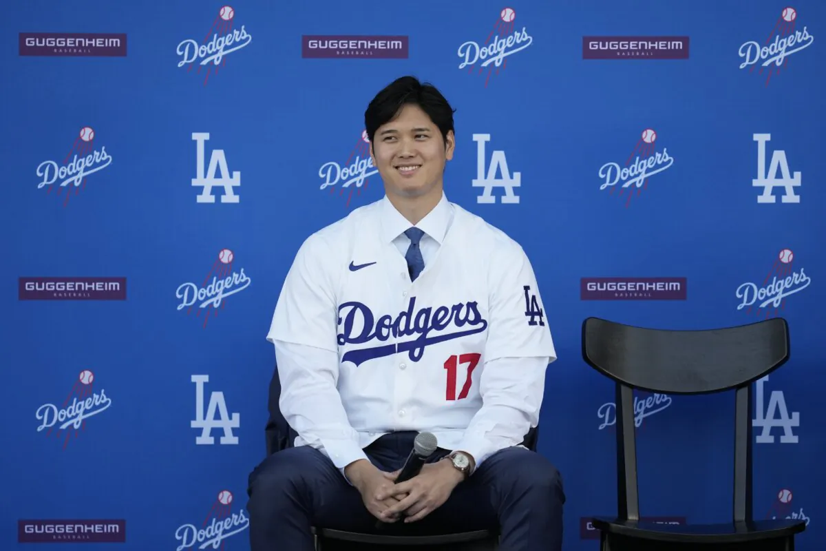 Los Angeles Dodgers' Shohei Ohtani answers questions during a baseball news conference at Dodger Stadium in Los Angeles on Dec. 14, 2023. (Ashley Landis/AP Photo)