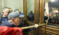 Police in Serbia Fire Tear Gas at Election Protesters Threatening to Storm Capital’s City Hall