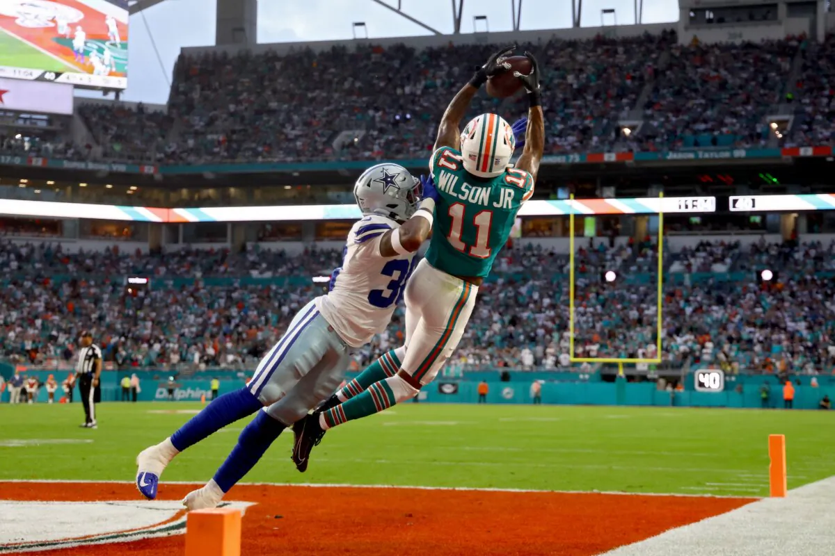 Juanyeh Thomas (30) of the Dallas Cowboys breaks up a pass intended for Cedrick Wilson Jr. (11) of the Miami Dolphins during the second quarter in Miami Gardens, Fla., on Dec. 24, 2023. (Megan Briggs/Getty Images)