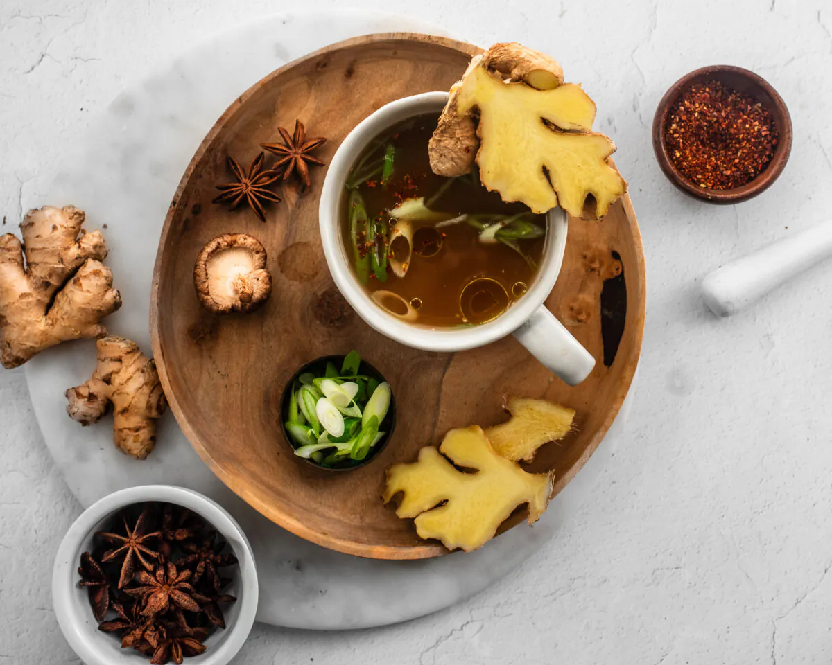 Mushrooms and aromatics add depth of flavor to this nourishing bone broth. (Jennifer McGruther)