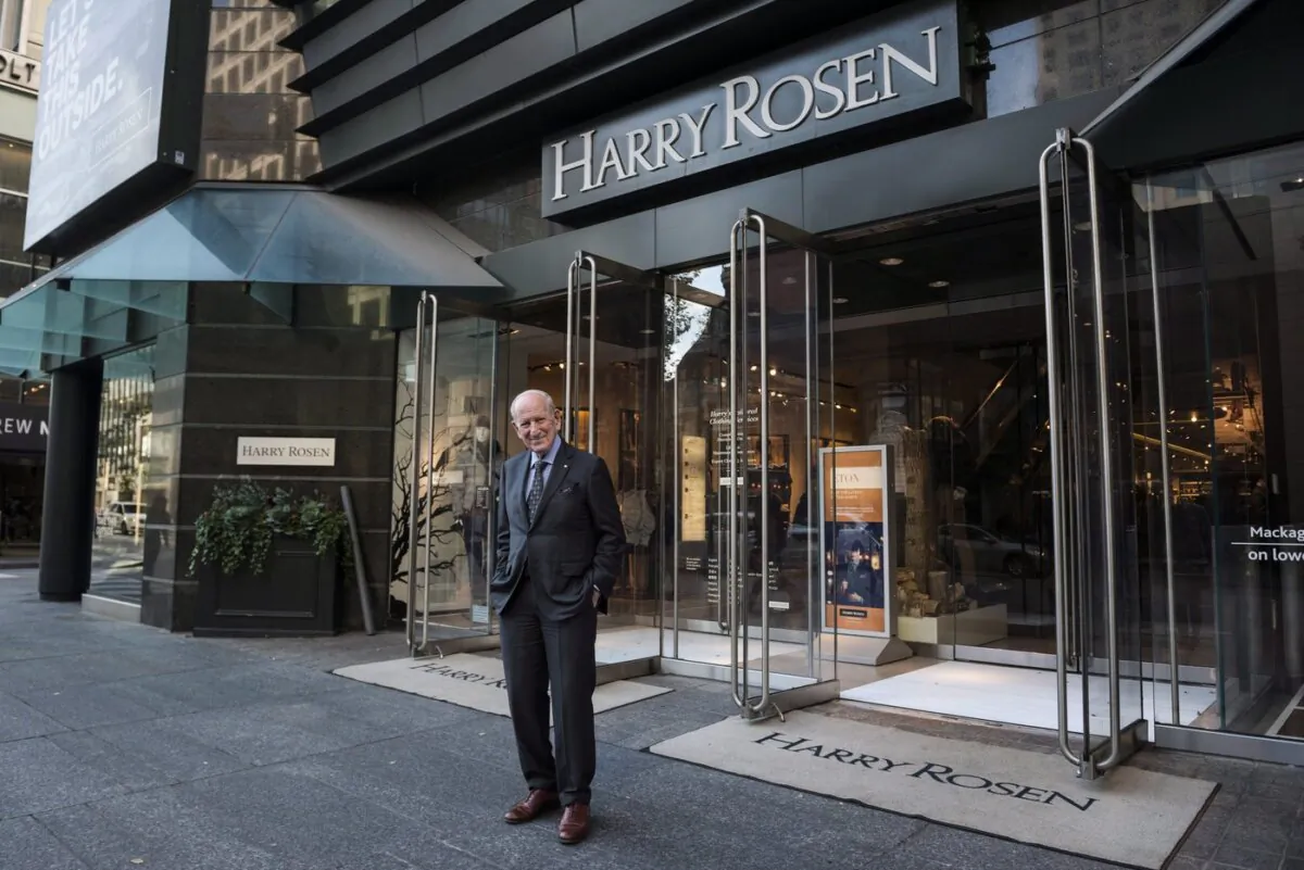 Canadian menswear titan Harry Rosen poses for a portrait in front of his Bloor Street store in Toronto, on Oct. 19, 2016. (The Canadian Press/Christopher Katsarov)