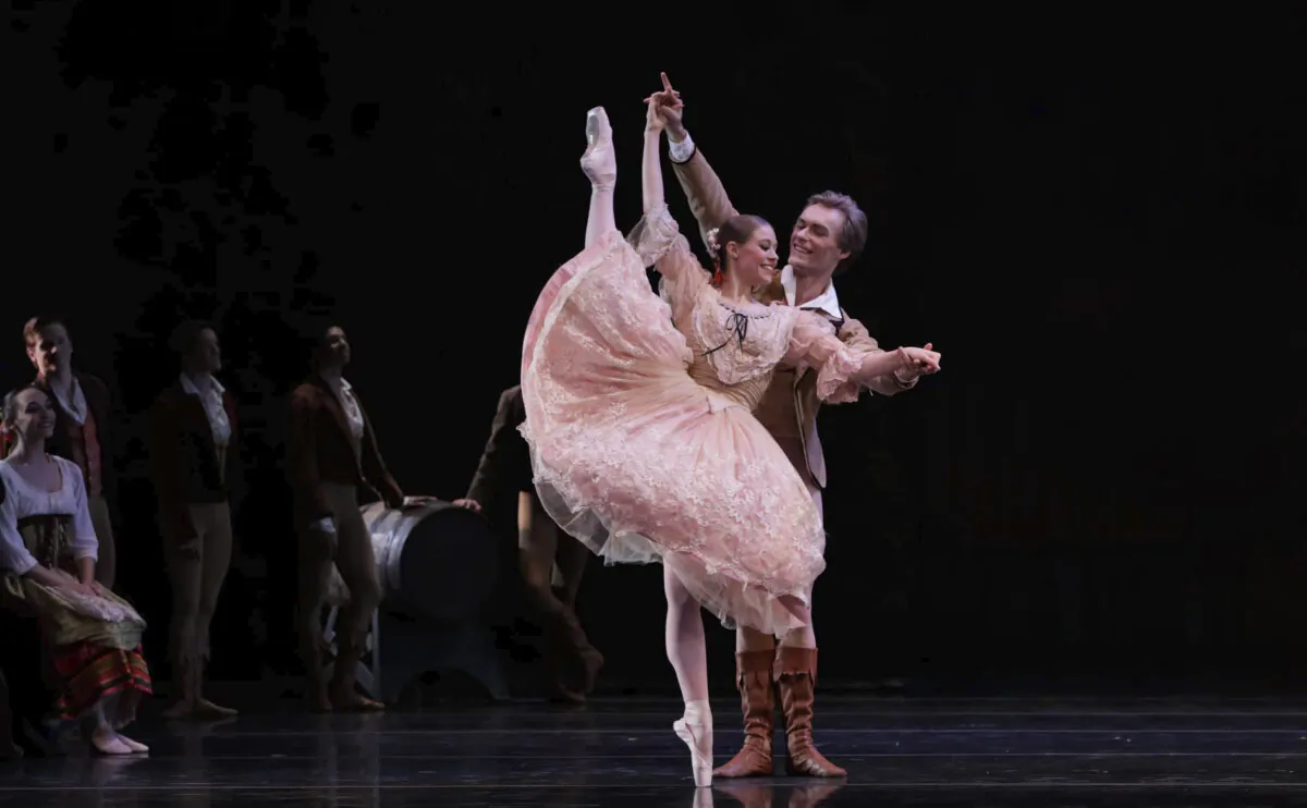 Paige Nyman performs
in a production of
“Swan Lake” in 2018, with
Alexander Kotelenets. (Amitava Sarkar)