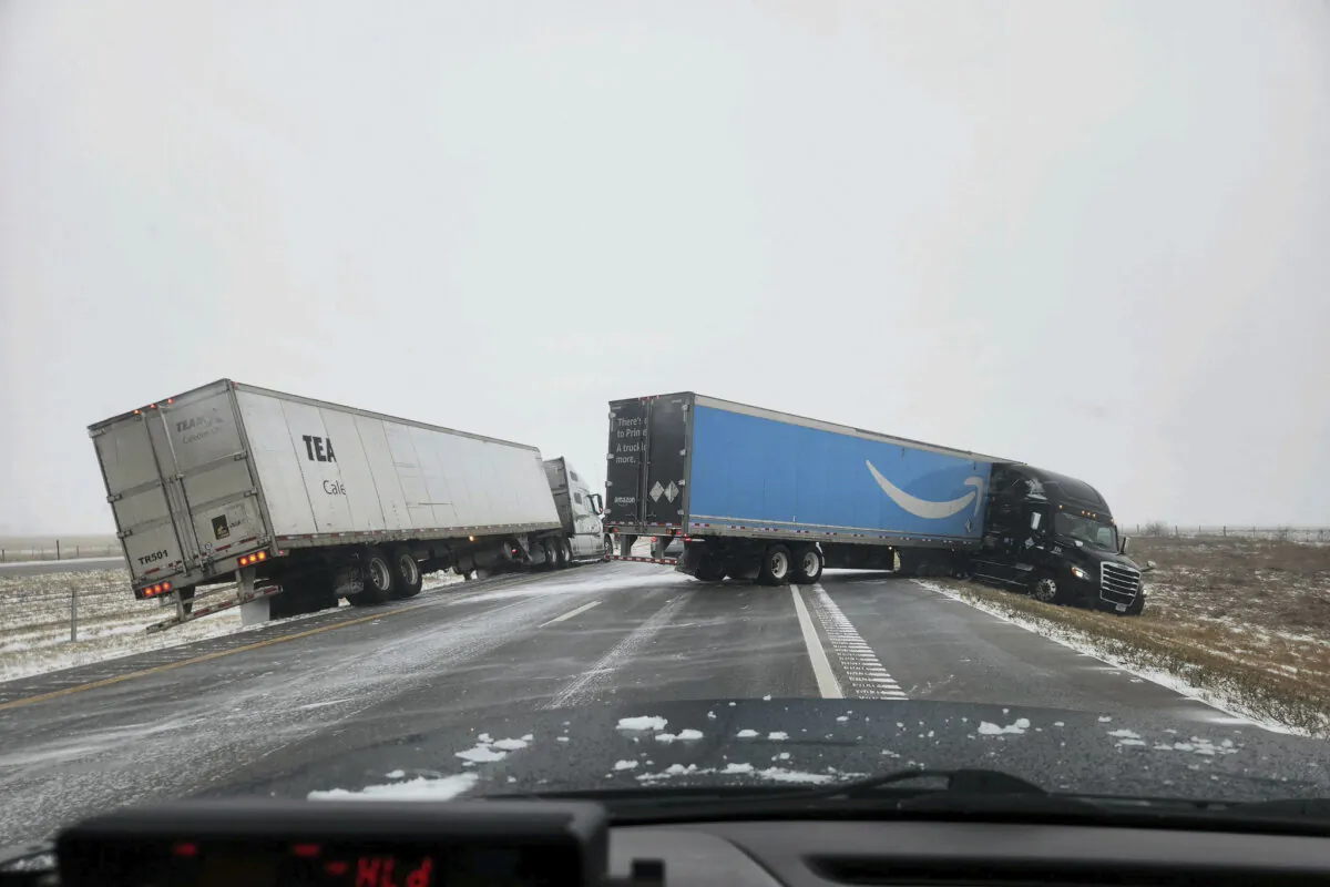 Two tractor-trailers lose control on Christmas Day on Interstate 80 in Nebraska as a winter storm pummels part of the Midwest, on Dec. 25, 2023. (Nebraska State Patrol via AP)