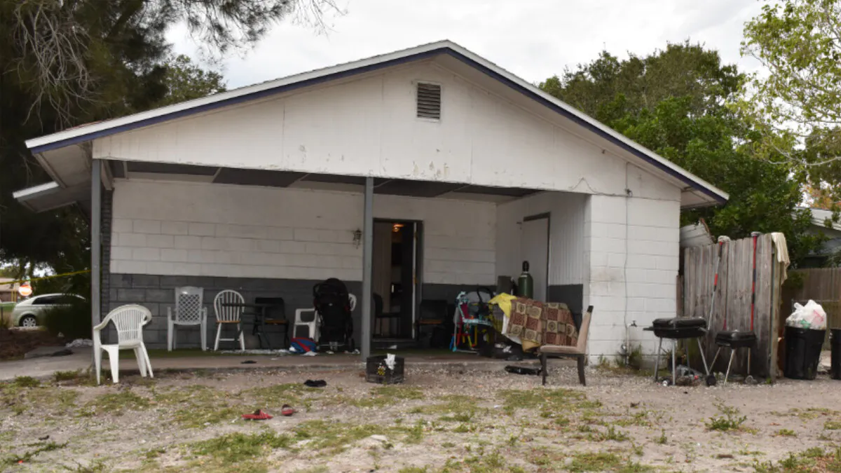 This photo provided by on  Dec. 27, 2023, shows the house in Largo, Fla., where a woman holding her 11-month-old son in a baby carrier was fatally shot by her 14-year-old brother while trying to diffuse an argument over Christmas gifts he was having with a 15-year-old brother who also was armed with a gun, authorities said. (Pinellas County Sheriff’s Office via AP)