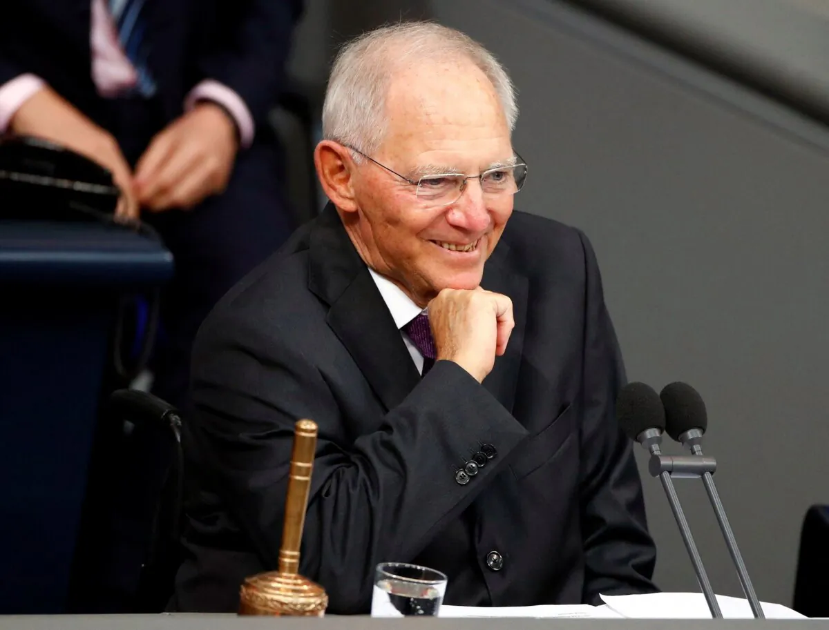 Newly-elected Bundestagsraesident Wolfgang Schaeuble smiles as he conducts the first plenary session at the German lower house of Parliament, Bundestag, after a general election in Berlin on Oct. 24, 2017. (Hannibal Hanschke/Reuters)