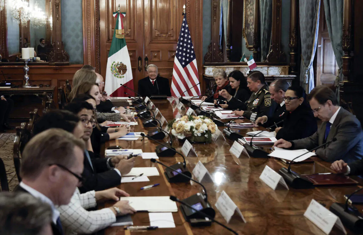 Mexican President Andres Manuel Lopez Obrador (C) attends a meeting with U.S. Secretary of State Antony Blinken, U.S. Secretary of Homeland Security Alejandro Mayorkas, and U.S. Ambassador Ken Salasar (out of frame), in addition to other officials, at the Palacio Nacional in Mexico City on Dec. 27, 2023. (Rodrigo Oropeza/AFP via Getty Images)