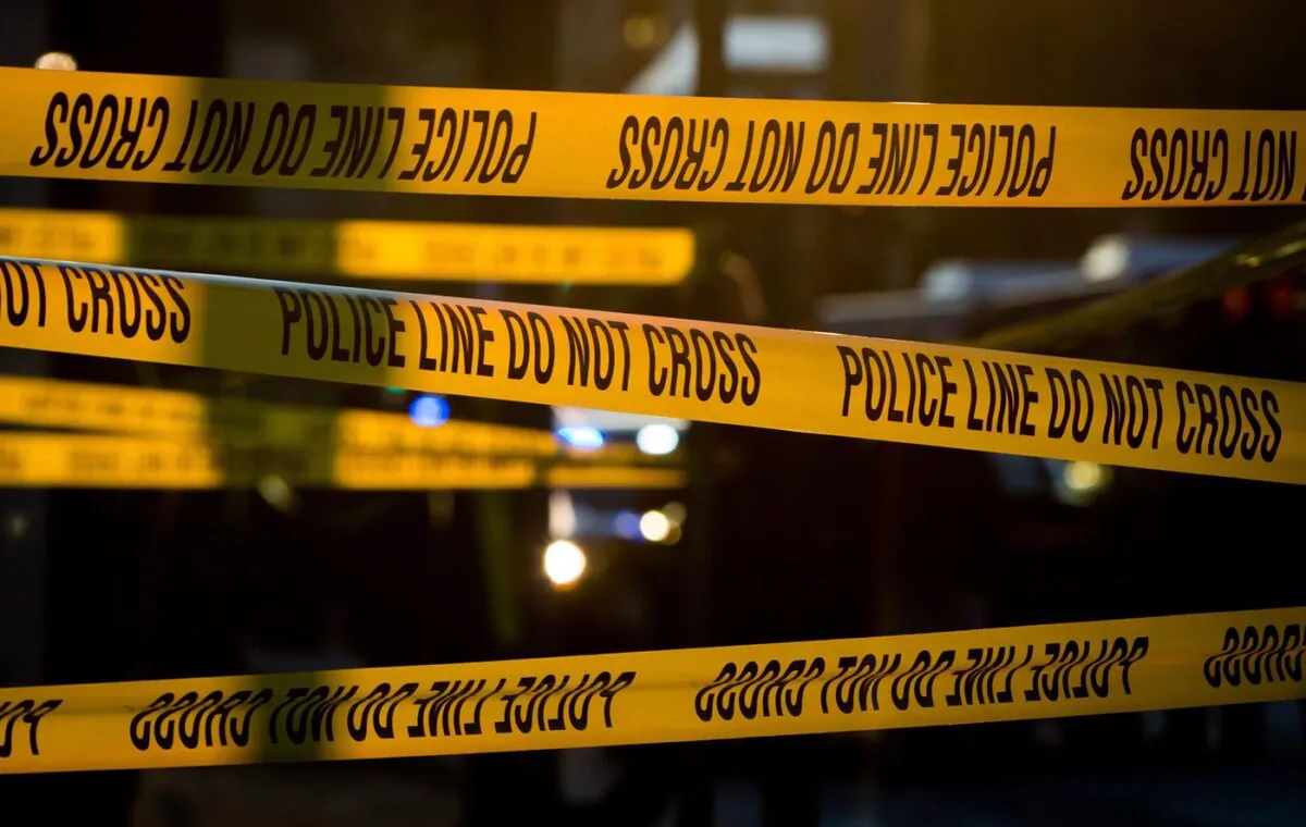 Police tape cordons off a crime scene in the Downtown Eastside of Vancouver, B.C., on April 9, 2015. (The Canadian Press/Darryl Dyck)