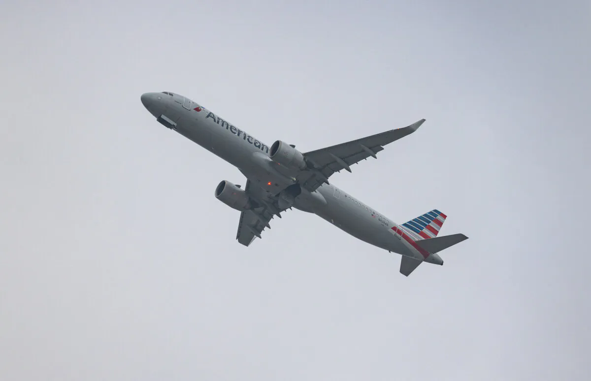 An American Airlines jet lands at John Wayne Airport in Santa Ana, Calif., on Dec. 27, 2023. (John Fredricks/The Epoch Times)