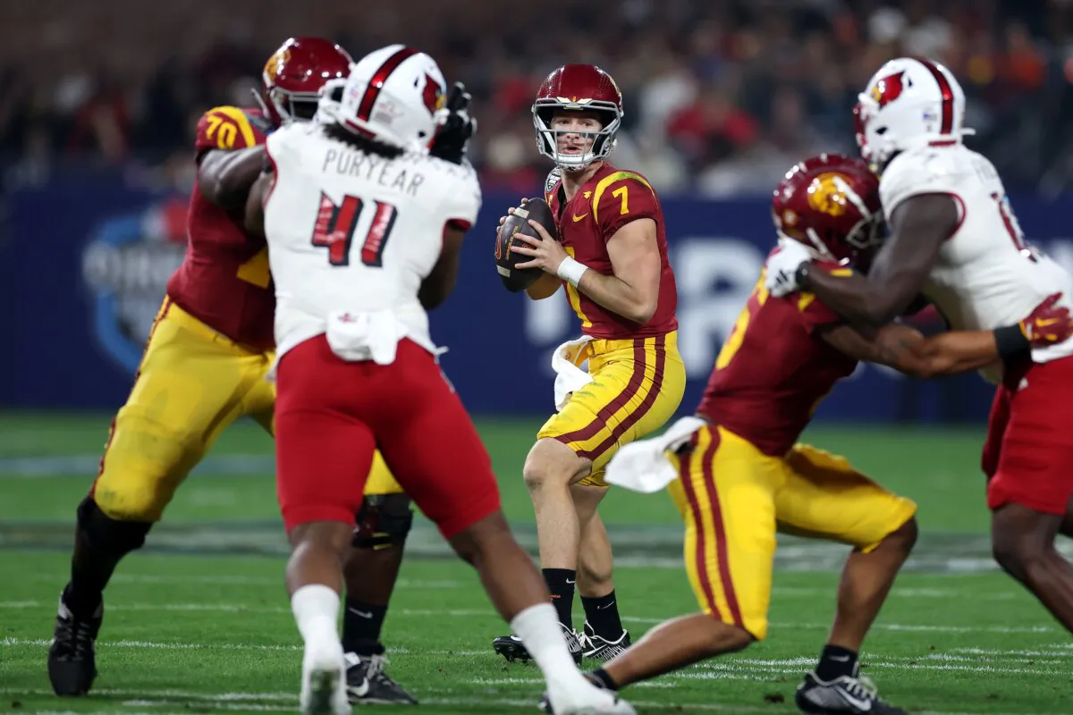 USC quarterback Miller Moss looks to pass against Louisville during the Holiday Bowl in San Diego on Dec. 27, 2023. (Sean M. Haffey/Getty Images)