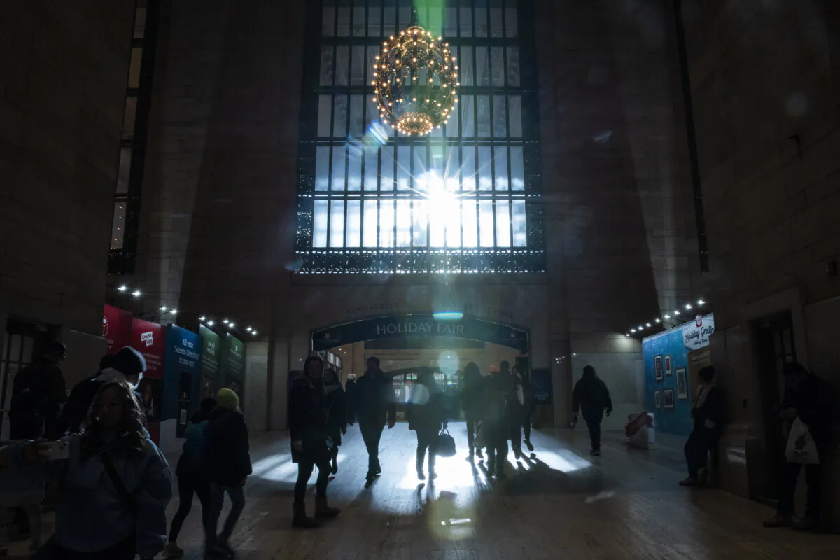 Travelers walk through Grand Central Terminal in New York on Dec. 21, 2023. (Eduardo Munoz Alvarez/AP Photo)
