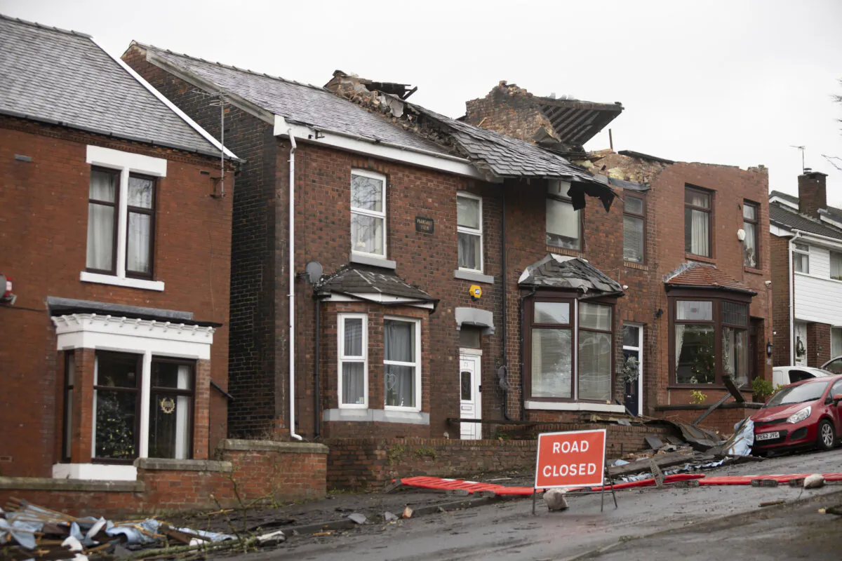 Roofs can be seen ripped off homes on Hough Hill Road following a tornado in Stalybridge, England on Dec. 28, 2023. (Ryan Jenkinson/Getty Images)