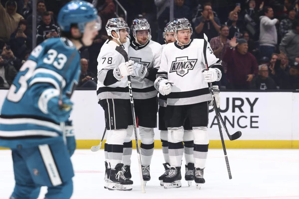 Los Angeles Kings center Pierre-Luc Dubois (80) celebrates with his teammates after scoring a gaol during the second period of a game against the San Jose Sharks in Los Angeles on Dec. 27, 2023. (Jessica Alcheh/USA TODAY Sports via Field Level Media)