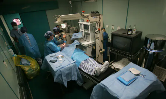 Chinese Doctor Caught on Video Punching Elderly Patient During Eye Surgery