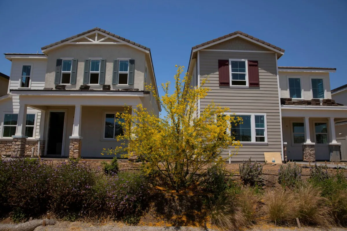 Residential single-family homes by KB Home are shown under construction in the community of Valley Center, Calif., on June 3, 2021. (Mike Blake/Reuters)