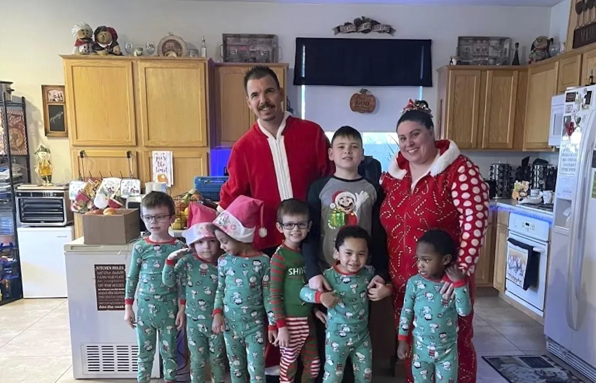 Karen Lopez and her husband, Jerry Lopez, are seen with their seven children in December 2023. (Karen Lopez via AP)