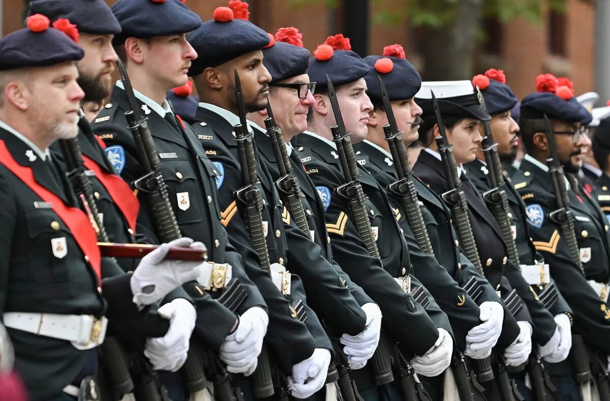 Members of the Canadian Armed Forces stand to attention during a Remembrance Day ceremony in Montreal on Nov. 11, 2023. (The Canadian Press/Graham Hughes)