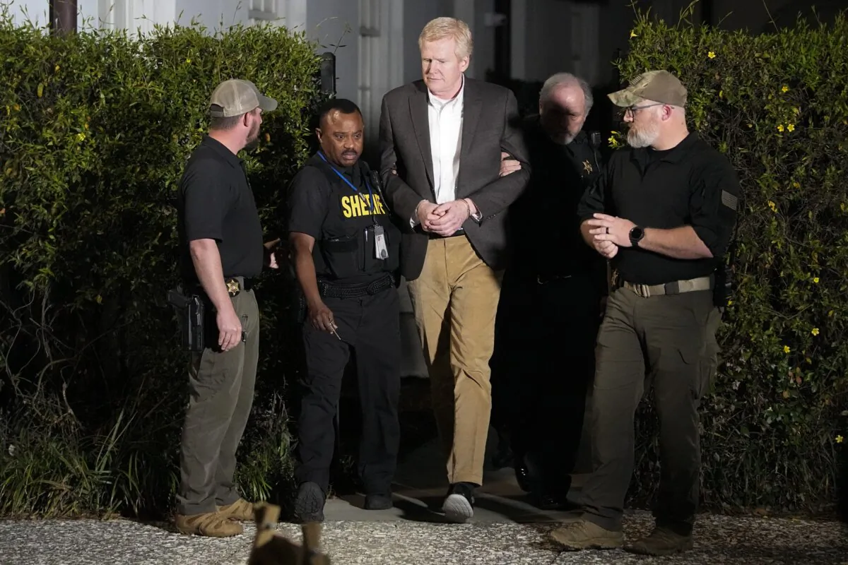 Alex Murdaugh (C) is led out of Colleton County Courthouse by sheriff's deputies after being convicted in Walterboro, S.C., on March 2, 2023. (Chris Carlson/AP Photo)