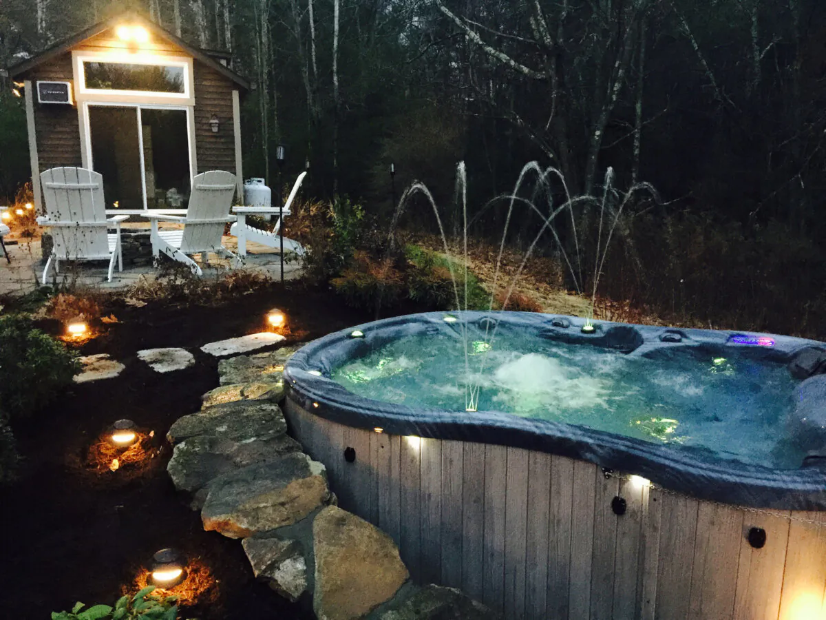 A hot tub is partially built into the side of hill creating a dynamic outdoor oasis. (Handout/TNS)
