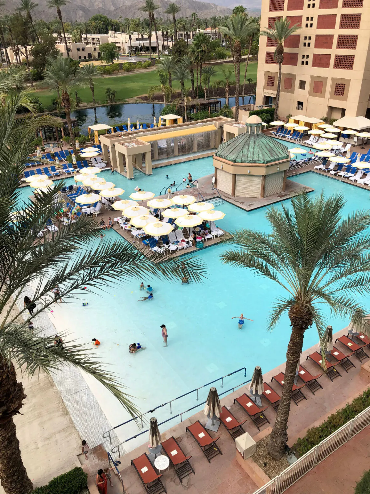 The author and her mother enjoyed watching families in the pool from their sixth-floor balcony at the Renaissance Esmeralda Resort & Spa, in Indian Wells, Calif. (Courtesy of Nicola Bridges)