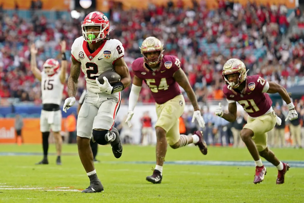 Kendall Milton (2) of the Georgia Bulldogs runs with the ball in the first quarter against the Florida State Seminoles during the Capital One Orange Bowl in Miami Gardens, Fla., on Dec. 30, 2023. (Rich Storry/Getty Images)