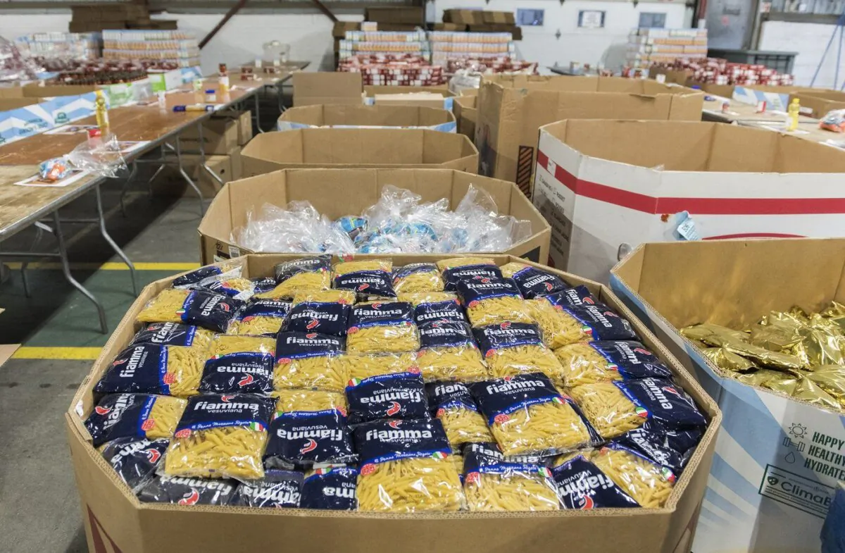 Boxes of donated food items are shown at the Moisson Montreal food bank in Montreal, Dec. 7, 2019. (The Canadian Press/Graham Hughes)
