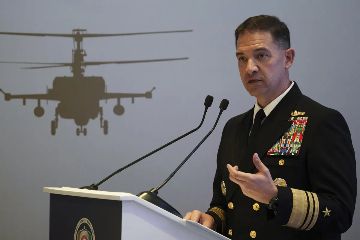 U.S. Navy Vice Adm. Brad Cooper, who heads the Navy's Bahrain-based 5th Fleet, speaks at an event at the International Defense Exhibition and Conference in Abu Dhabi, United Arab Emirates, on Feb. 21, 2023. (Jon Gambrell/AP Photo)