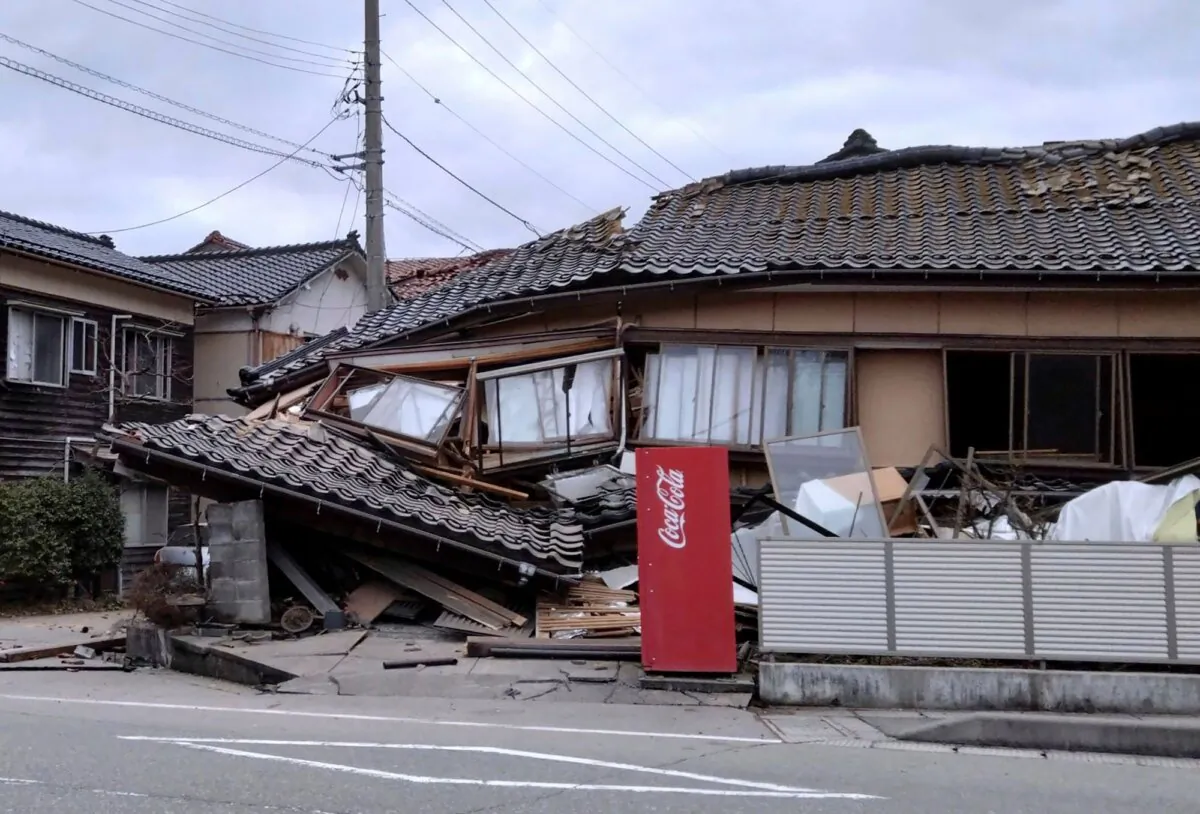 A house is damaged by an earthquake in Wajima, Ishikawa prefecture, Japan, on Jan. 1, 2024. (Kyodo News via AP)