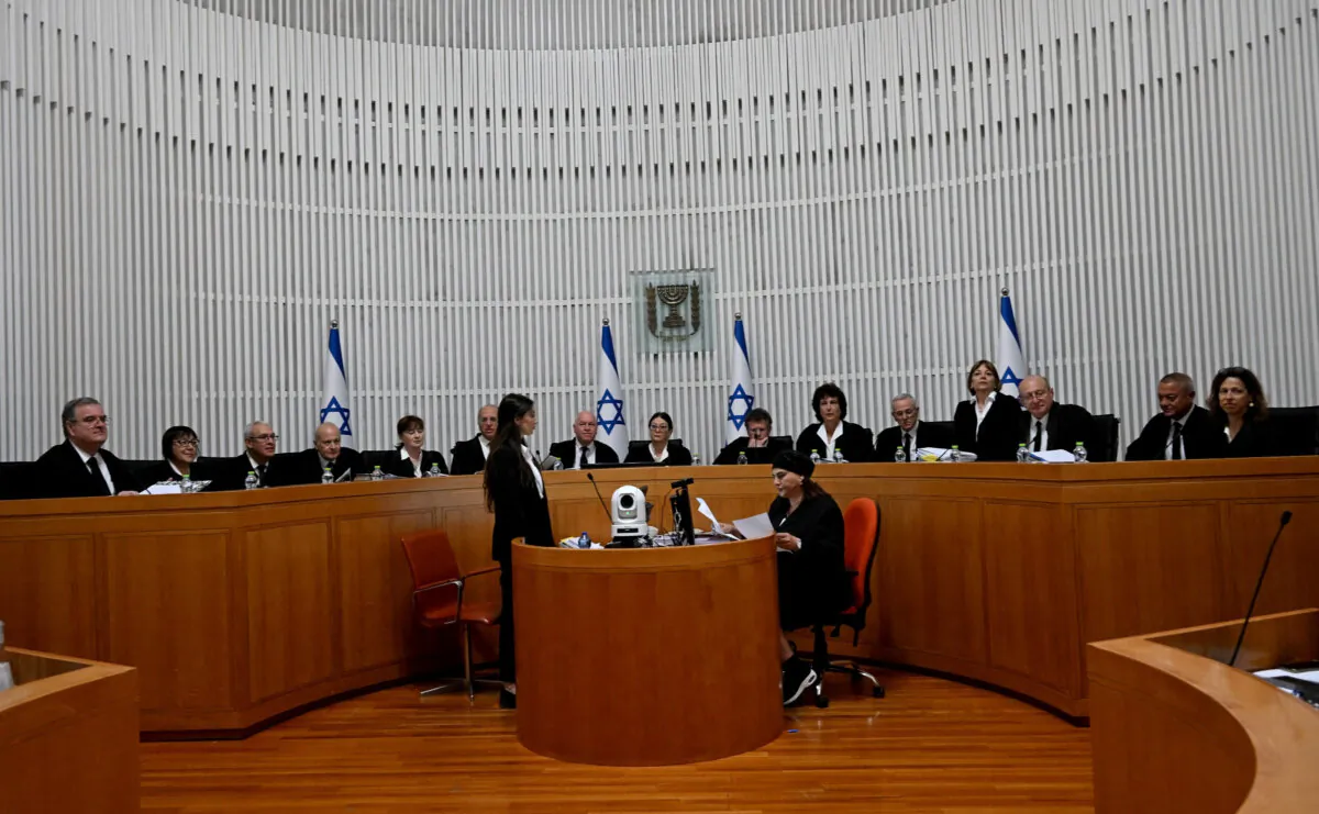 President of the Supreme Court of Israel Esther Hayut and all fifteen justices assemble to hear petitions against the reasonableness standard law in the High Court in Jerusalem on Sept. 12, 2023. (Debbie Hill/Pool via Reuters)