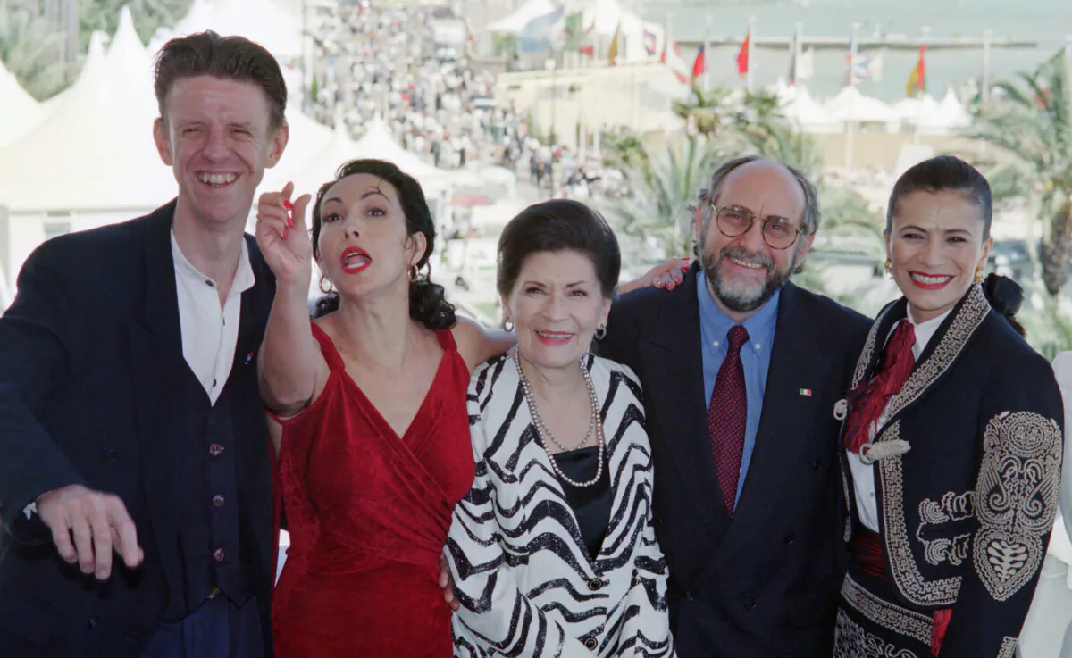 (L–R) British actor Alex Cox, Mexican actress Blanca Guerra and Ana Ofelia Murguia, Mexican film director Arturo Ripstein, and Mexican Actress Patricia Reyes Spindola pose for the presentation of the film "La Reina de la noche" as part of the 47th Cannes Film Festival in Cannes, southern France, on May 19, 1994. (Georges Bendrihem/AFP via Getty Images)