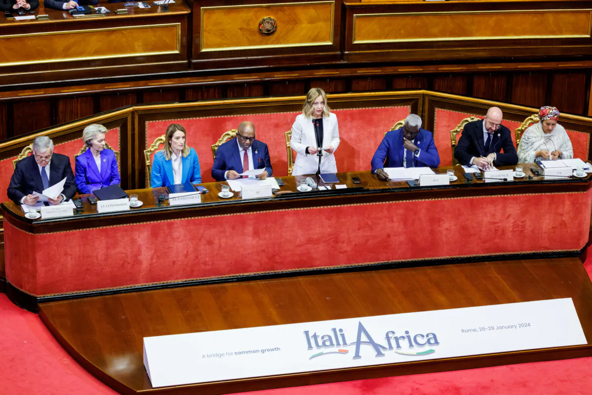 Italian Premier Giorgia Meloni, center, speaks as she is flanked from left; Italian Foreign Minister Antonio Tajani, President of the European Commission Ursula von der Leyen, President of the European Parliament Roberta Metsola, African Union President Azali Assoumani, African Union Commission Chairperson Moussa Faki Mahamat, President of the European Council Charles Michel and UN Deputy Secretary-General Amina Mohammed, at the Senate for the start of an Italy - Africa summit, in Rome, Monday, Jan. 29, 2024 (Roberto Monaldo/LaPresse via AP)