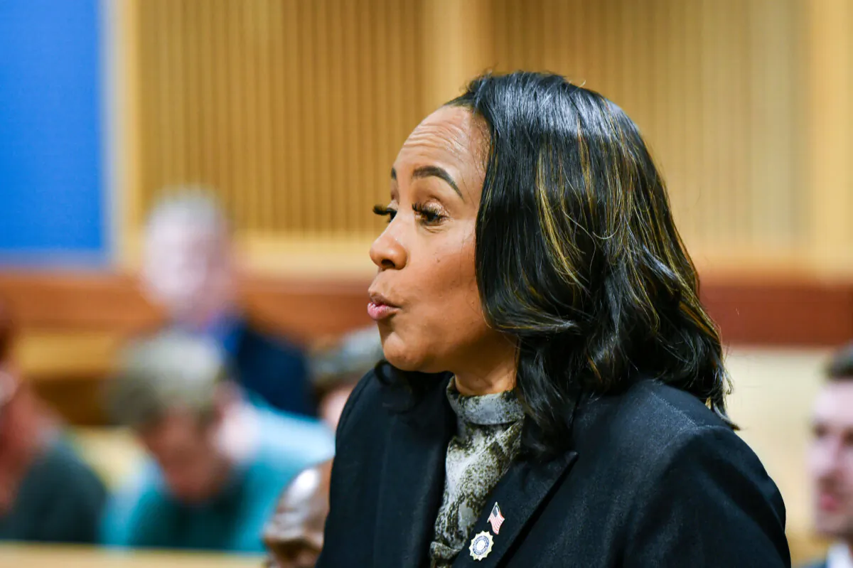 Fulton County District Attorney Fani Willis appears before Judge Scott McAfee for a hearing in the 2020 Georgia election interference case at the Fulton County Courthouse in Atlanta on Nov. 21, 2023. (Dennis Byron/Pool via Getty Images)