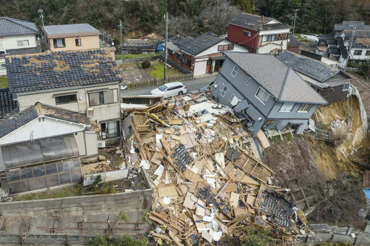 Damaged and destroyed homes along a street in Wajima, Ishikawa prefecture after a major 7.5 magnitude earthquake struck the Noto region in Ishikawa prefecture, on Jan. 2, 2024 . (Fred Mery/AFP via Getty Images)