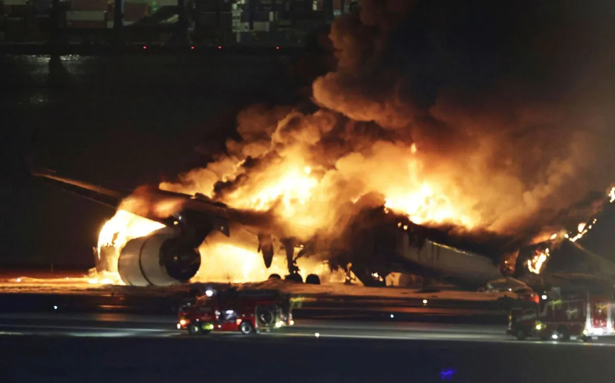 A Japan Airlines plane is on fire on the runway of Haneda airport in Tokyo on Jan. 2, 2024. (Kyodo News via AP)