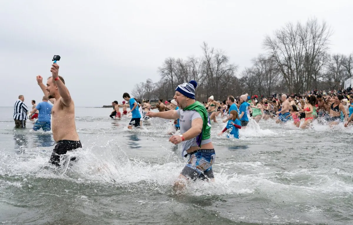 The tradition of swimming in lakes, oceans and other bodies of water made chilly by January’s Canadian temperatures dates back more than a century. (The Canadian Press)