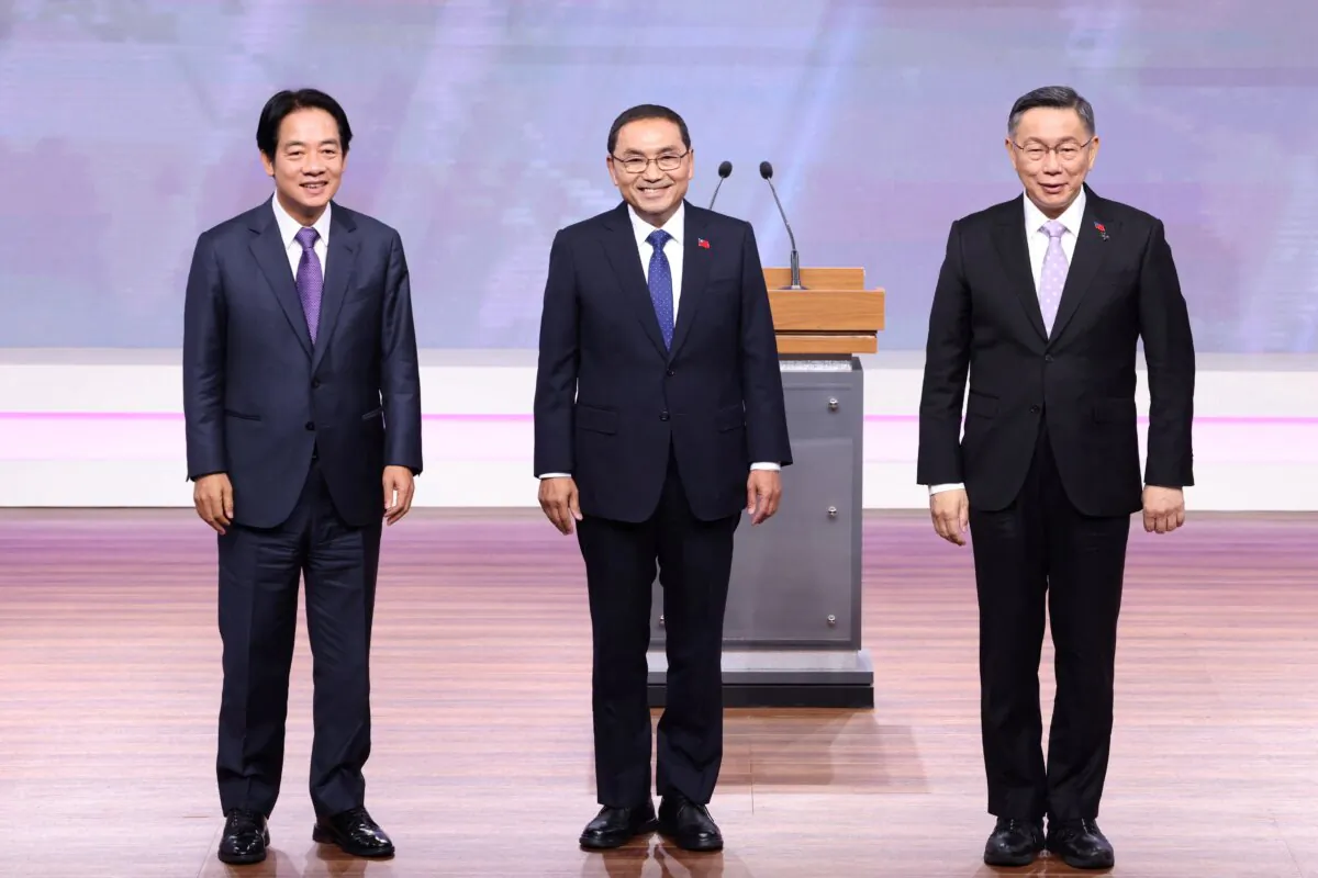 (L-R) Lai Ching-te, presidential candidate from the ruling Democratic Progressive Party (DPP); Hou Yu-ih, presidential candidate from the main opposition Kuomintang (KMT); and Ko Wen-je, presidential candidate from the opposition Taiwan People's Party (TPP) pose for a picture during a debate in Taipei, Taiwan, on Dec. 30, 2023. (Pei Chen/Pool/AFP via Getty Images)